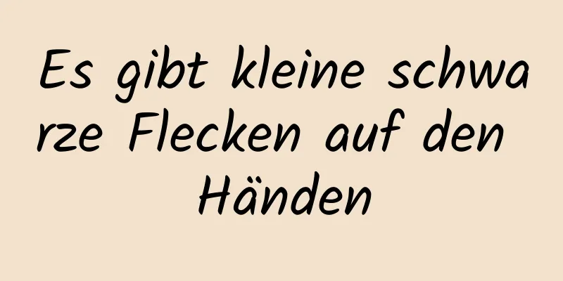 Es gibt kleine schwarze Flecken auf den Händen