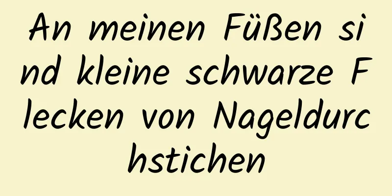 An meinen Füßen sind kleine schwarze Flecken von Nageldurchstichen