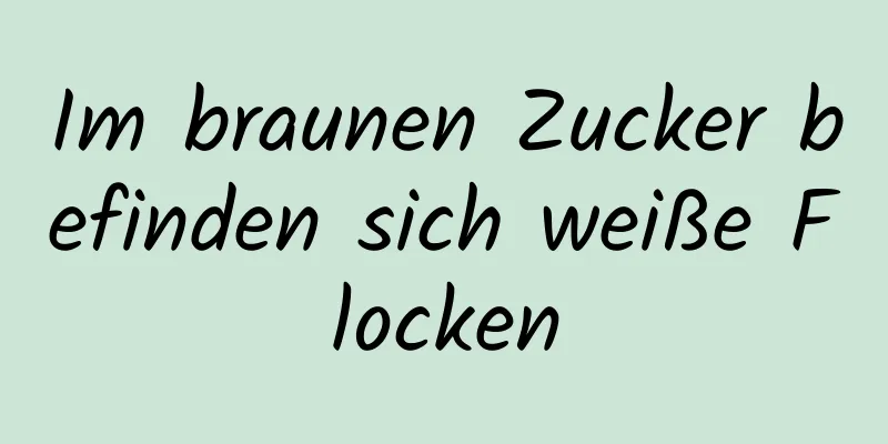 Im braunen Zucker befinden sich weiße Flocken