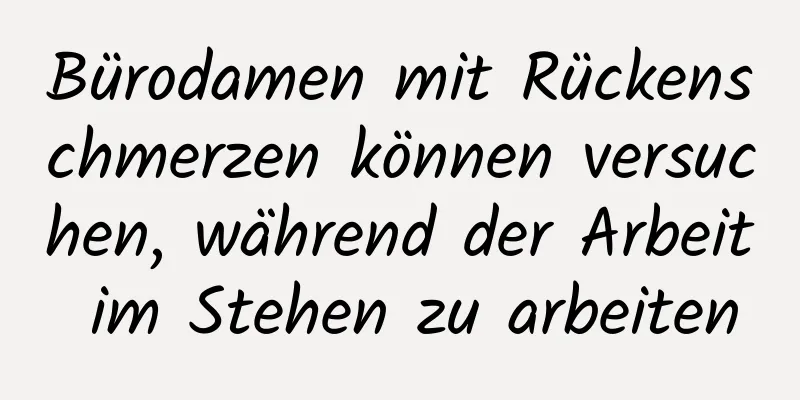Bürodamen mit Rückenschmerzen können versuchen, während der Arbeit im Stehen zu arbeiten